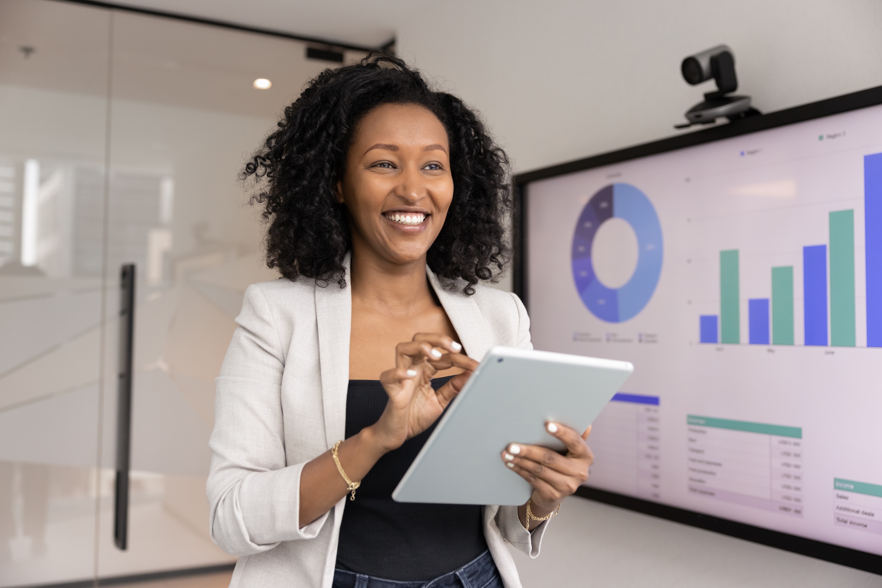 Successfully smiling your business woman using digital tablet